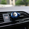 Blue Car Air Freshener placed in car vent, providing a fresh and stylish fragrance to your car's interior all year round.