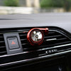 Red Car Air Freshener placed in car vent, providing a fresh and stylish fragrance to your car's interior all year round.