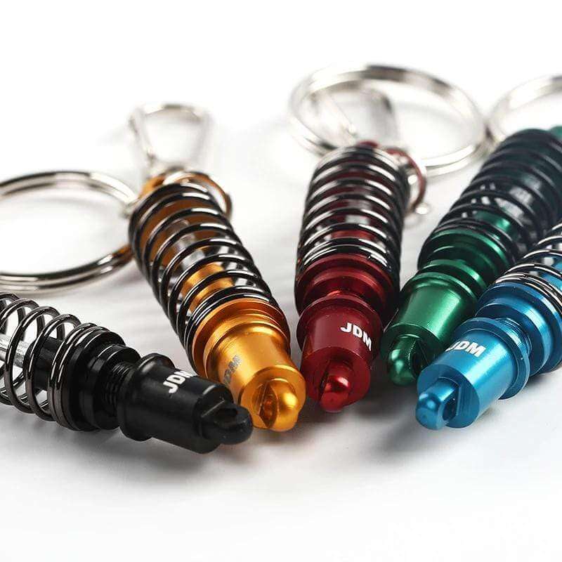 coilover-keychains-in-black_-yellow_-red_-green-and-blue_-jdm-keychains_-car-guy-gifts.jpg